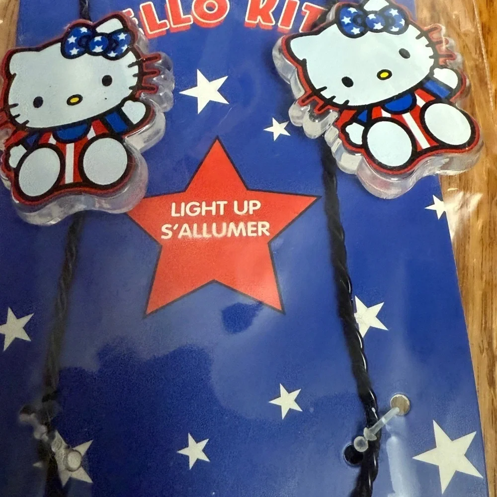 Claire's Hello Kitty Red White Blue Earrings and Light up Necklace set  NEW
